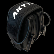 Load image into Gallery viewer, Cadre low profile earmuff folded to smallest size with AKT1 Sport logo on the headband
