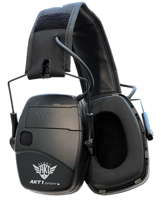 Black low-profile electronic ear muff with AKT1 Sport branding, designed for hearing enhancement and noise reduction.